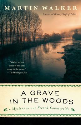 A grave in the woods A bruno, chief of police novel.